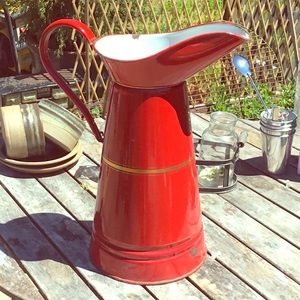 Large French vintage enamel red pitcher.